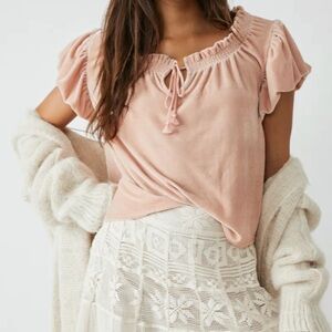 Free people new with tags coquette velvet top in a size large. Luxurious & soft